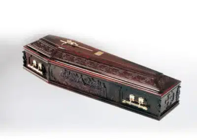 Solid wood coffin featuring The Last Supper carved design with religious detailing